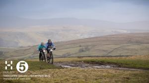 Cycling up the hill we'd run up later
